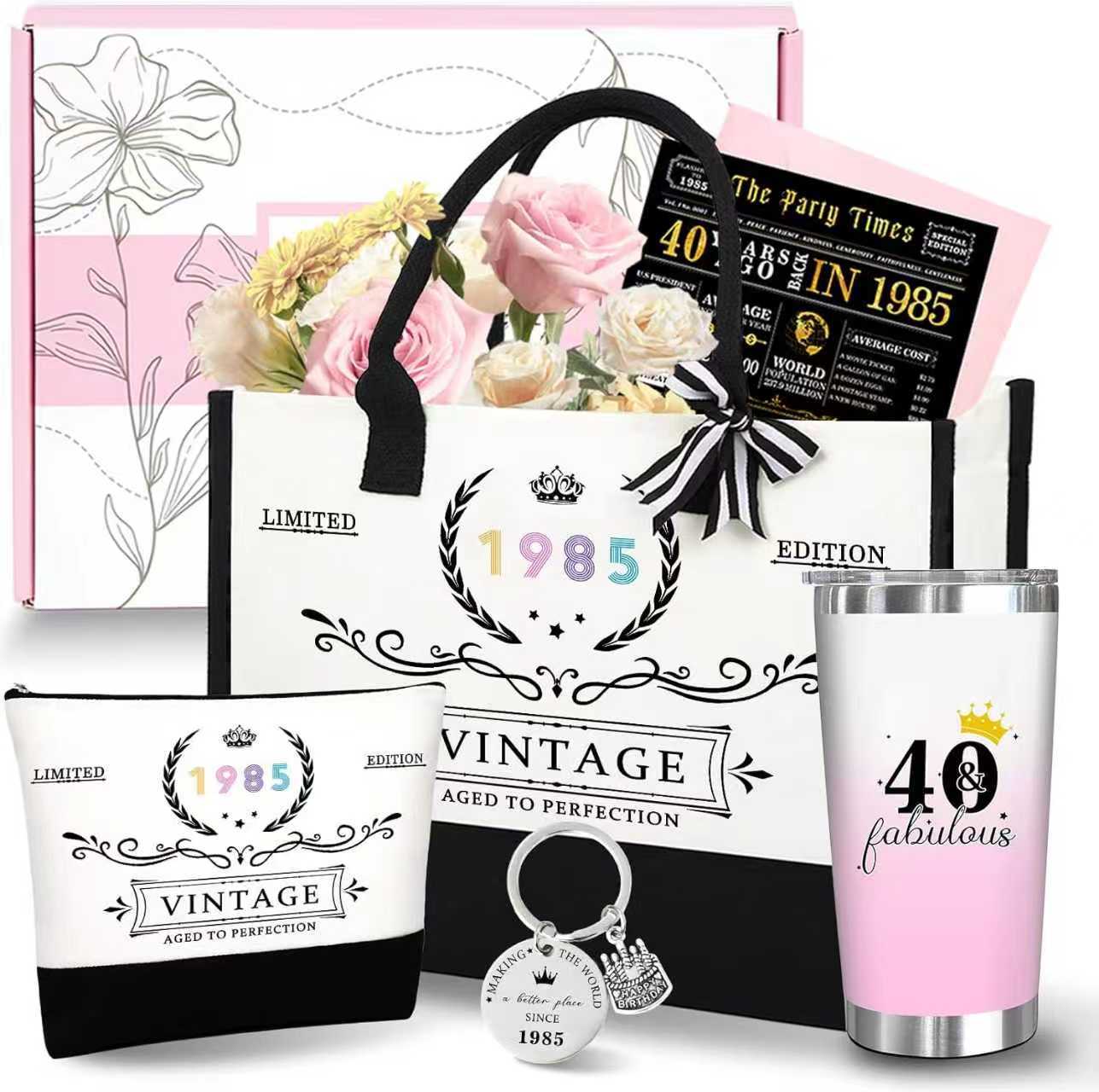 Gift set with tote bag, flowers, tumbler, and keychain with '1985' and '40 & fabulous' design.