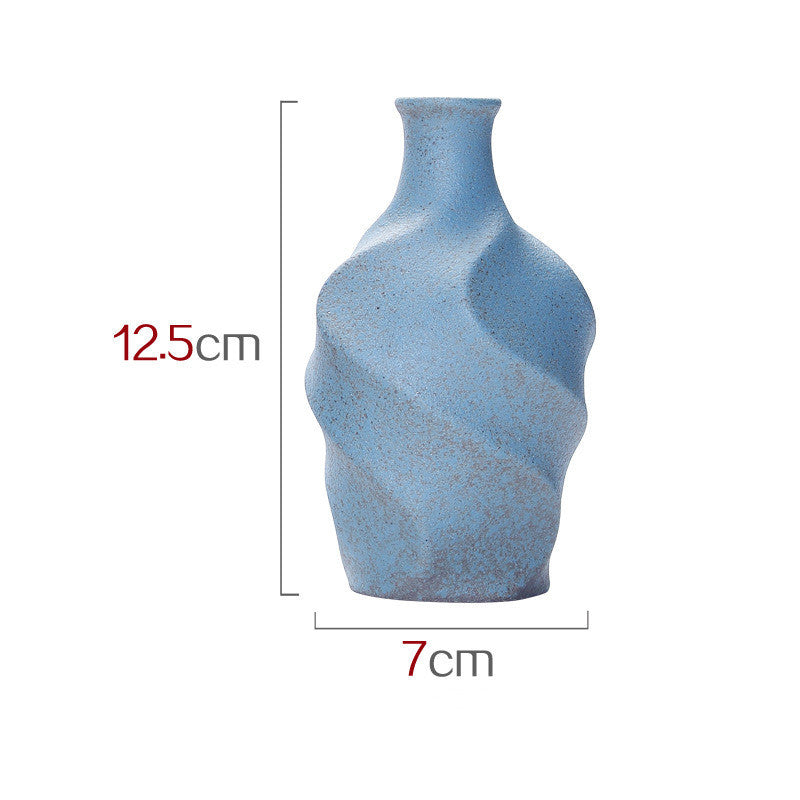 Blue textured vase with dimensions on a white background