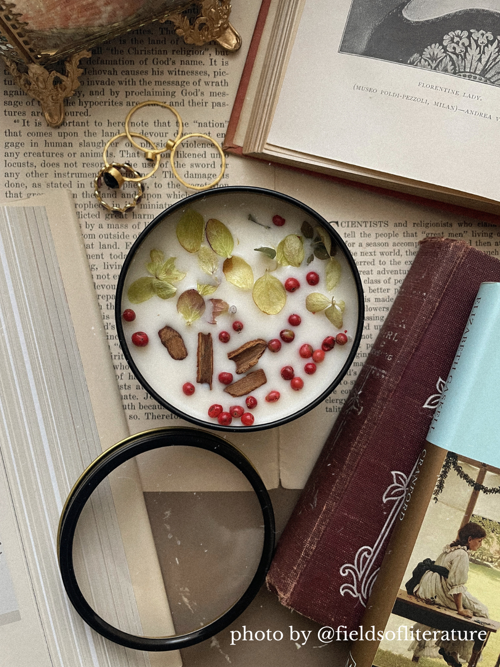 Magnifying glass over a dish with food on an open book