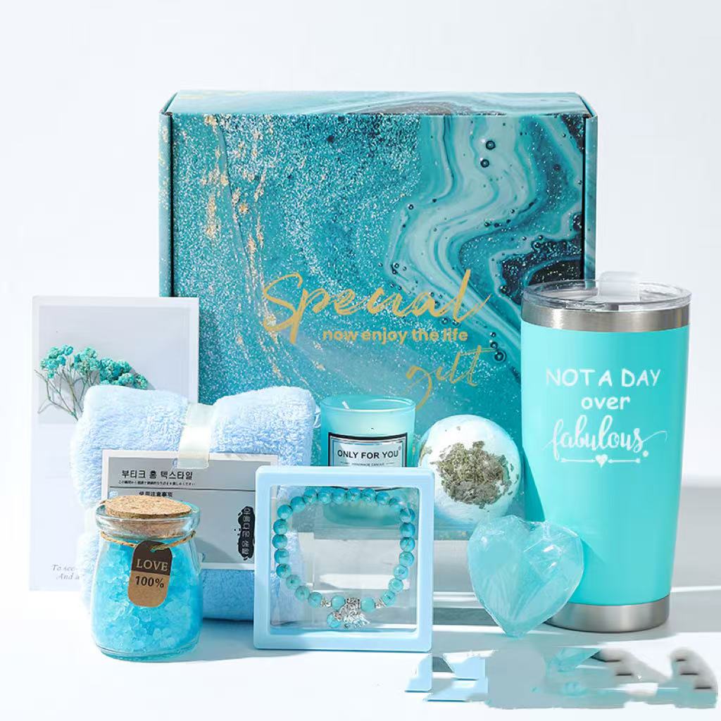Collection of turquoise-themed gifts including a tumbler, box, and decorative items on a white background.
